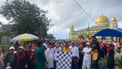 Polsek Towuti Kawal Gerak Jalan Santai Sambut Tahun Baru Islam 1 Muharram 1445H Dengan Tema Di tahun baru Islam kita tumbuhkan kepedulian sesama UMMAT muslim